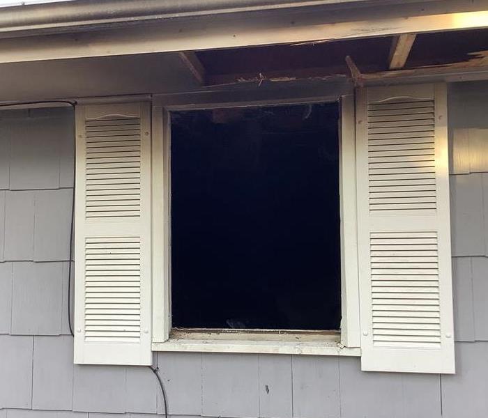 Window gone from firefighters to put out a fire in this Toms River home