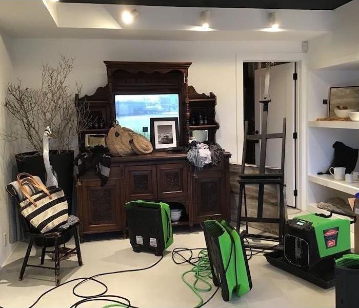 Store showroom with SERVPRO drying equipment
