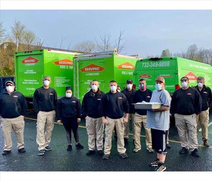 SERVPRO of Toms River crew & Harry's Smokin' BBQ outside with masks on for protection against Covid-19