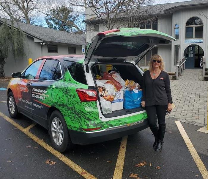 Picture of SERVPRO of Toms River car filled with food at OceanMHS for Thanksgiving Food Drive 2020