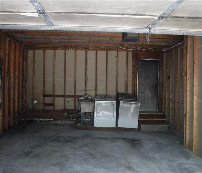 Garge with sheetrock removed after a fire